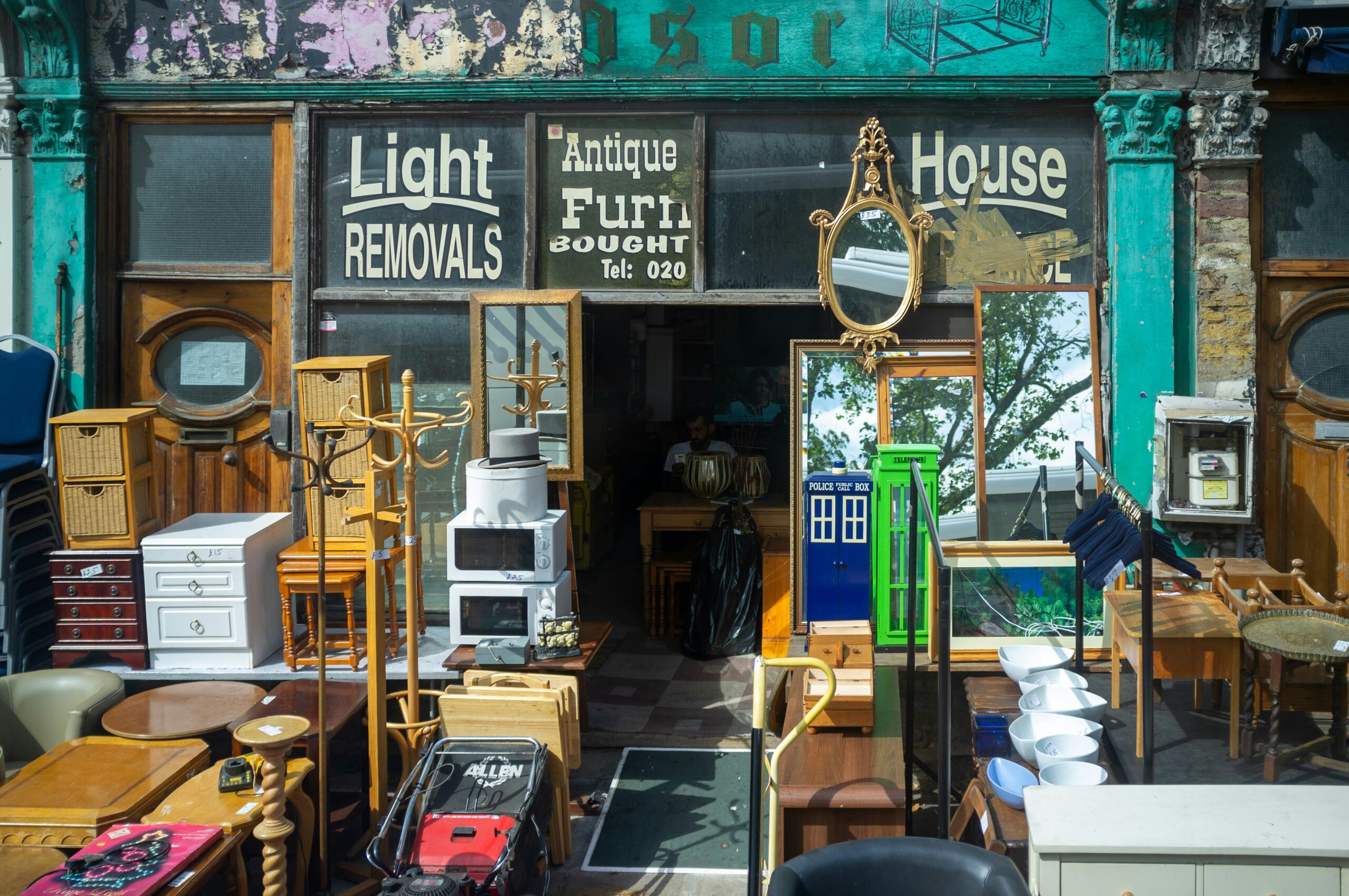 a room filled with lots of different types of furniture